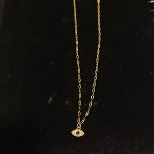 Elegant Gold Bracelet with Green Gemstone